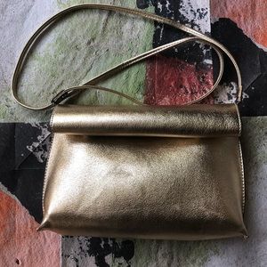 Silence + Noise Reversible Roll Clutch Crossbody